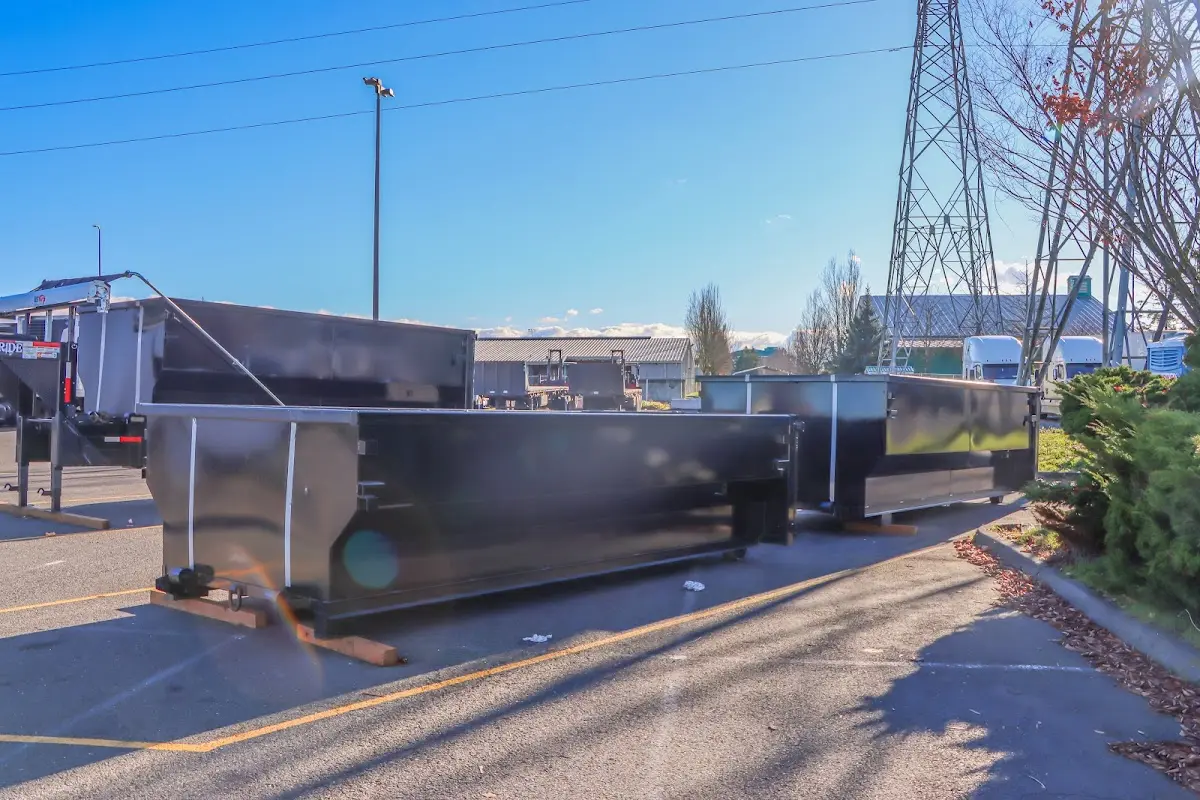 Roll-off dumpster ready for waste disposal at job site for 2 Yard Dumpster Rental in Oak Hills